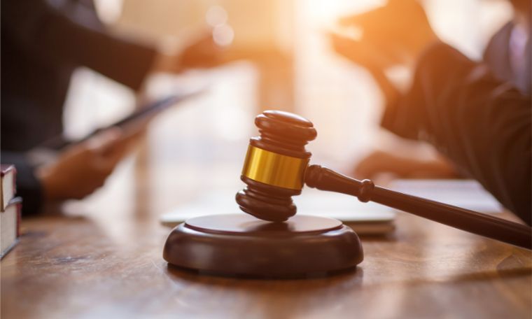 Gavel on a desk during a client meeting